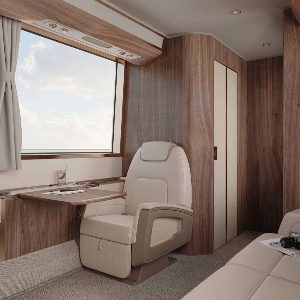 Executive bus interior featuring warm wood paneling, beige leather seating, and subtle ambient lighting
